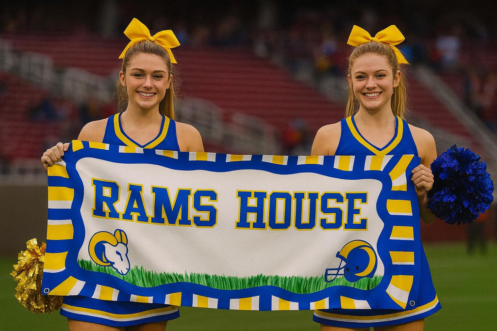 Custom football team spirit banner in blue and gold displayed by cheerleaders at a football game
